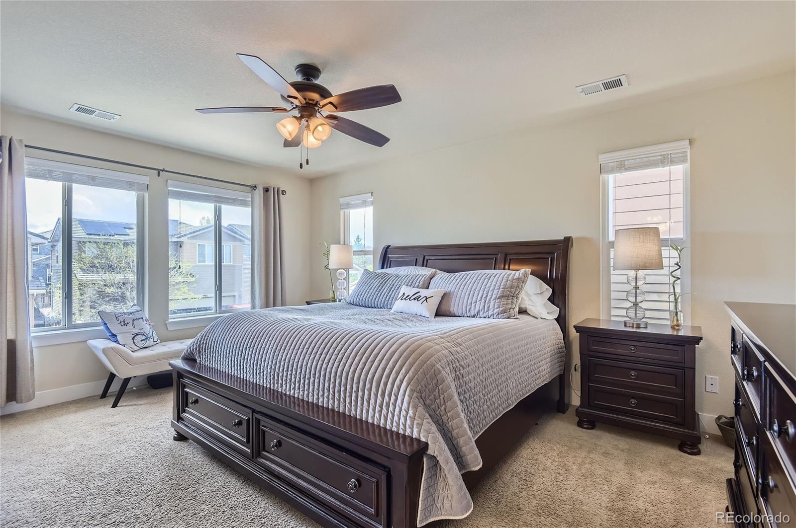 10495 Rutledge Street Parker, CO 80134 - Photo 13 of 32 a bedroom with a bed and a window