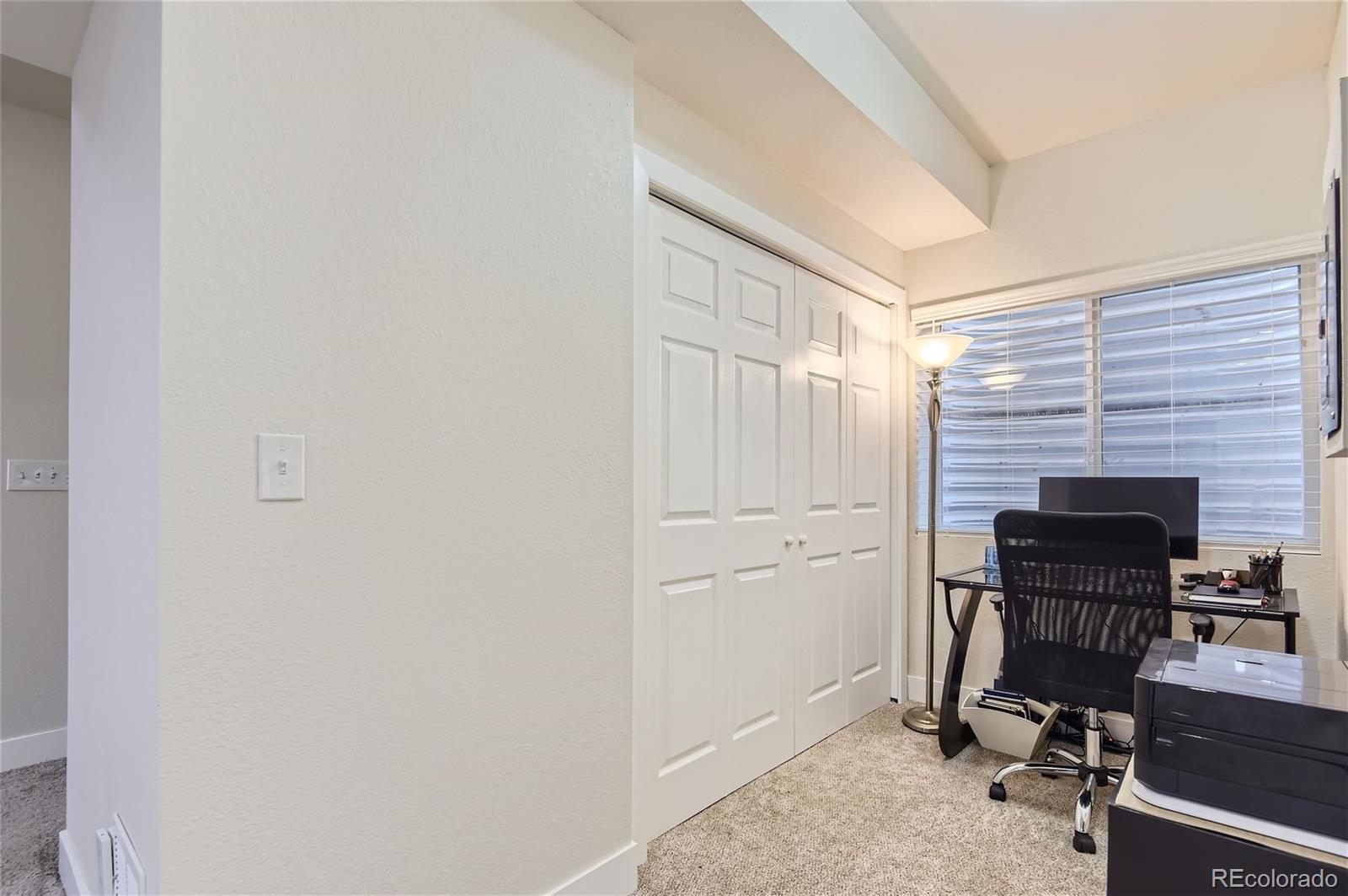 10495 Rutledge Street Parker, CO 80134 - Photo 24 of 32 a view of a workspace with furniture