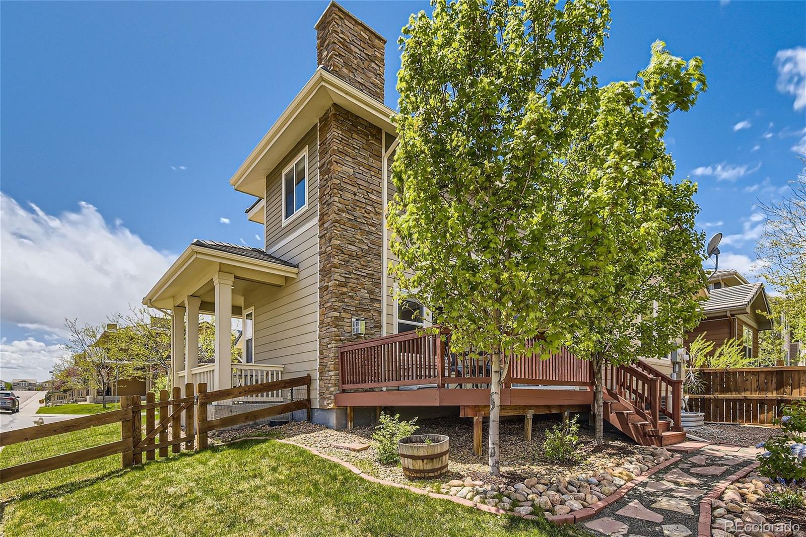 10495 Rutledge Street Parker, CO 80134 - Photo 28 of 32 a front view of a house with a yard
