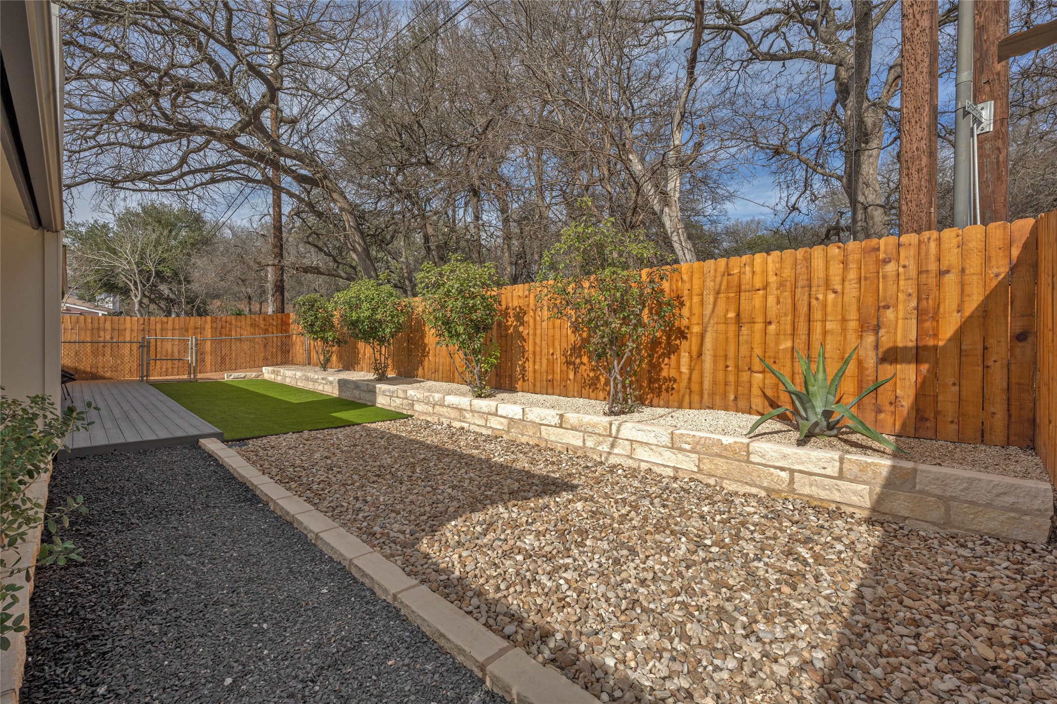2404 Monarch Drive Austin, TX 78748 - Photo 25 of 25 a view of a backyard with wooden fence