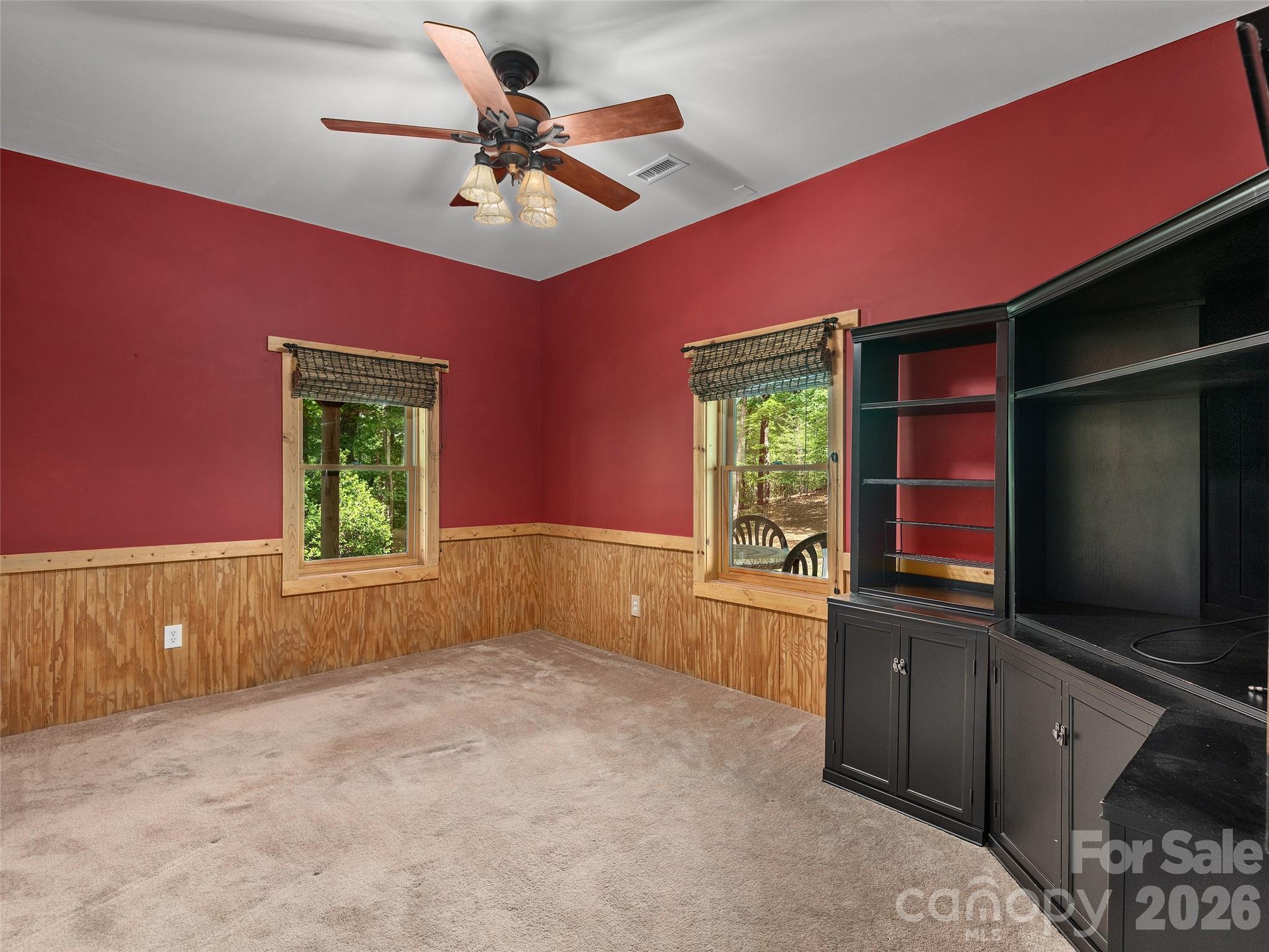 413 Green Hills Road Mill Spring, NC 28756 - Photo 36 of 48 a kitchen with window and cabinets