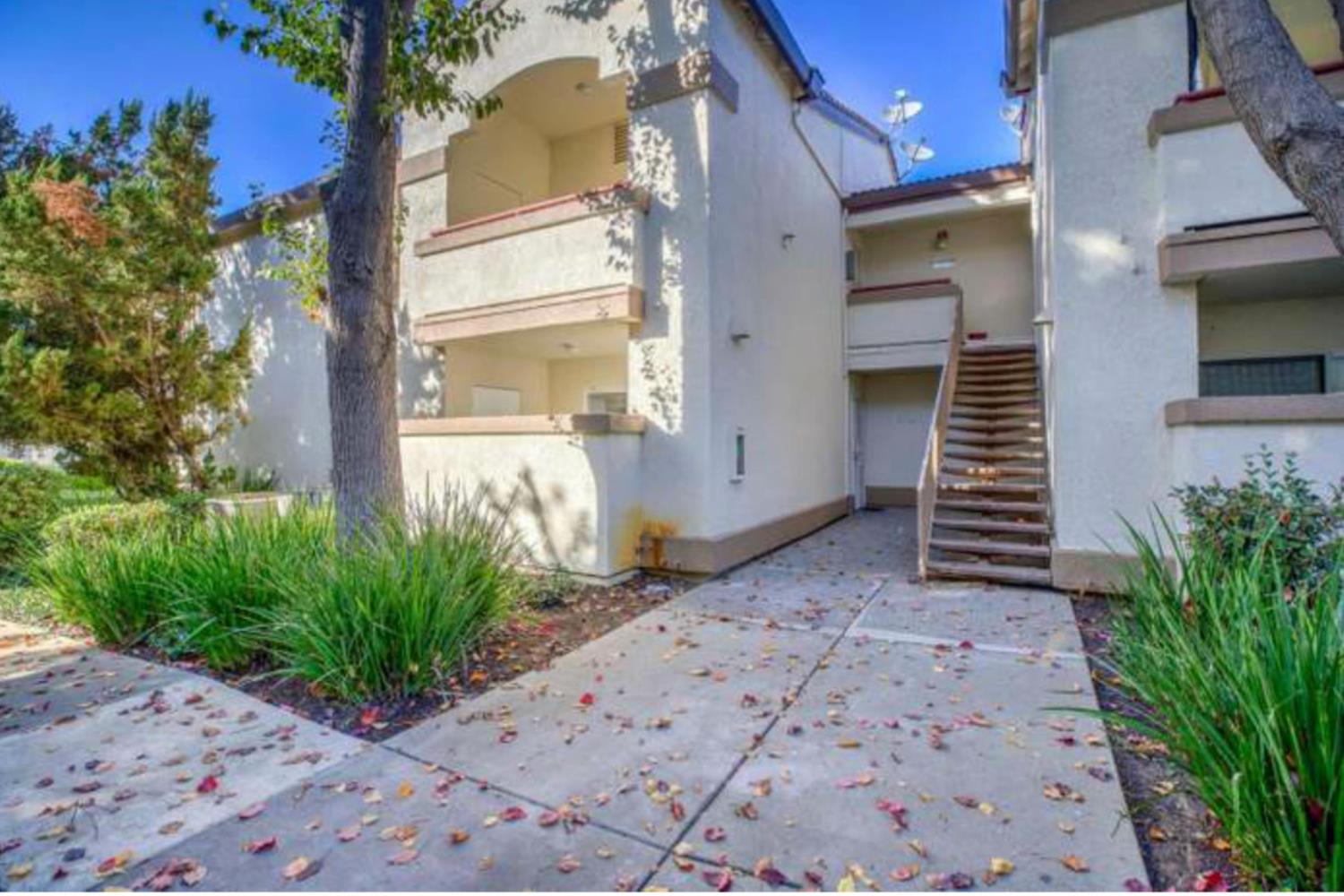 a house view with a garden space