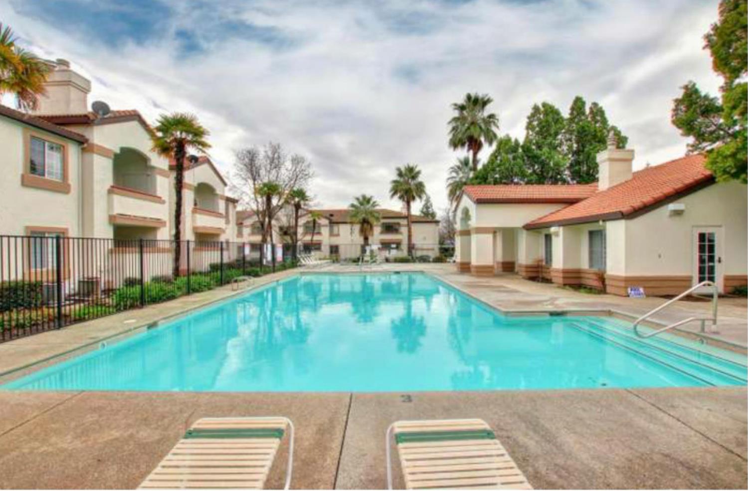 8020 Walerga Road, Unit 1147 Antelope, CA 95843 - Photo 20 of 20 a view of a swimming pool with a lounge chairs