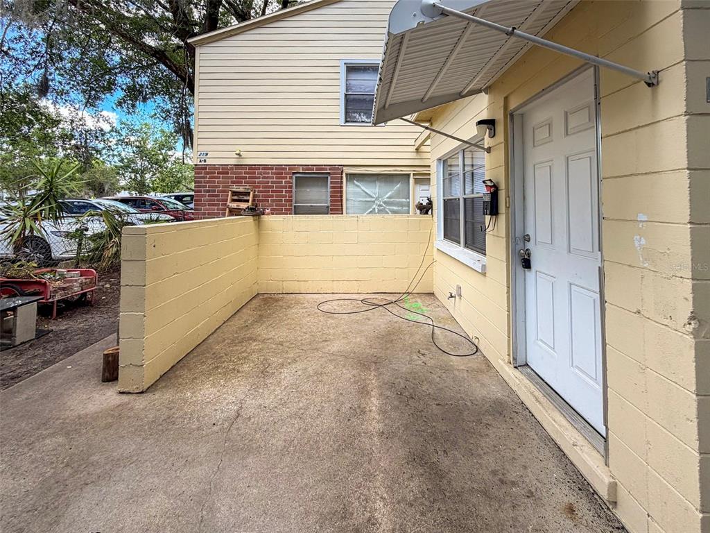 219 Northwest 3rd Avenue, Unit B Gainesville, FL 32601 - Photo 20 of 20 a view of a house with a outdoor space