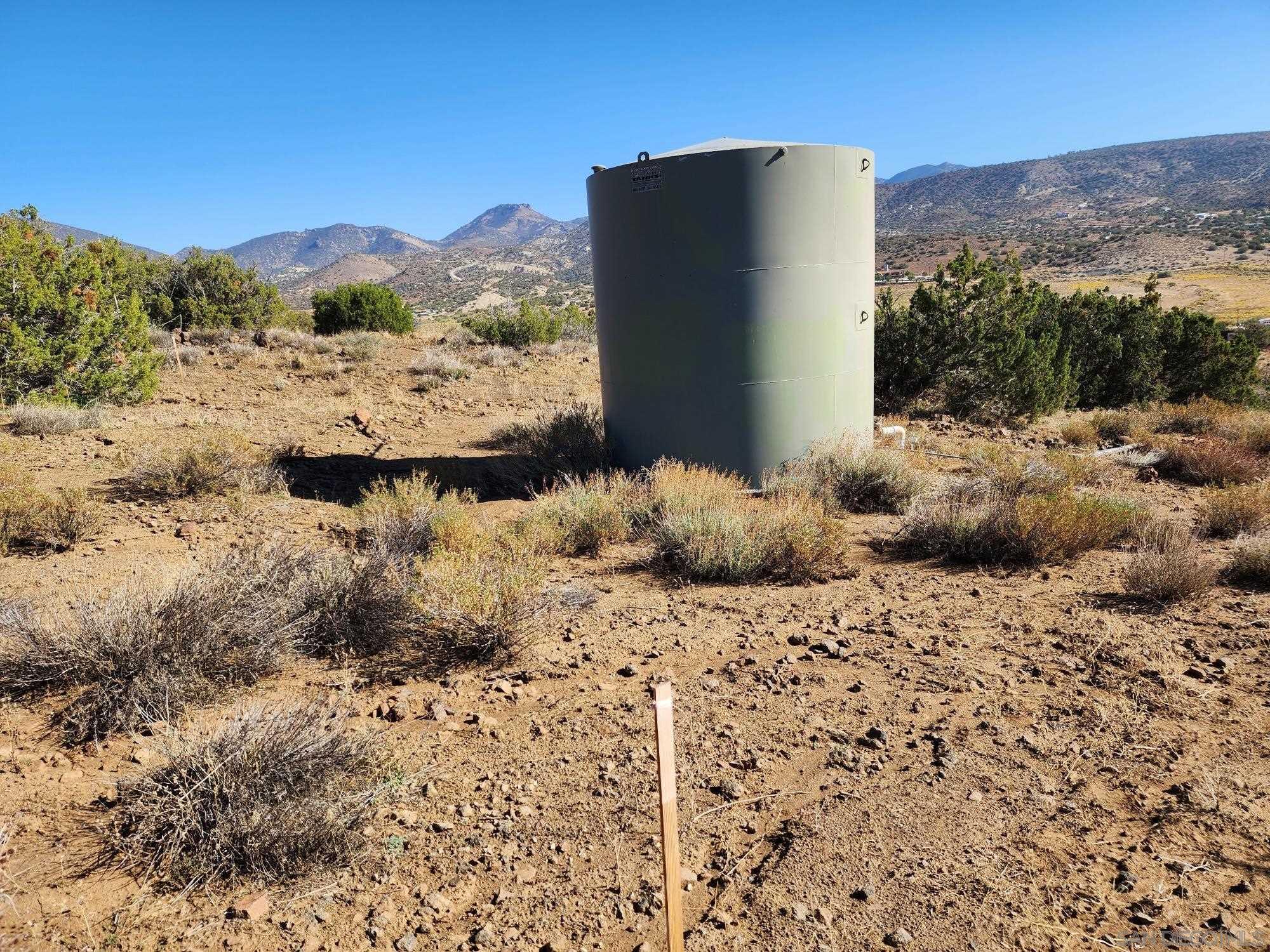 0 Inyanga Road Tehachapi, CA 93561 - Photo 4 of 6 a view of a lake with a mountain