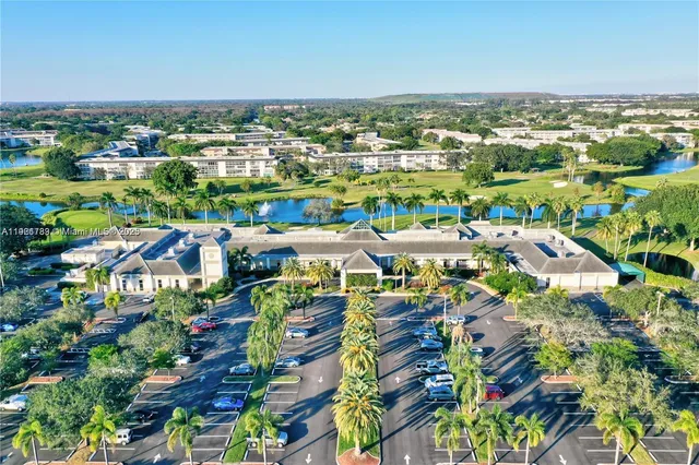 an aerial view of a house with a swimming pool