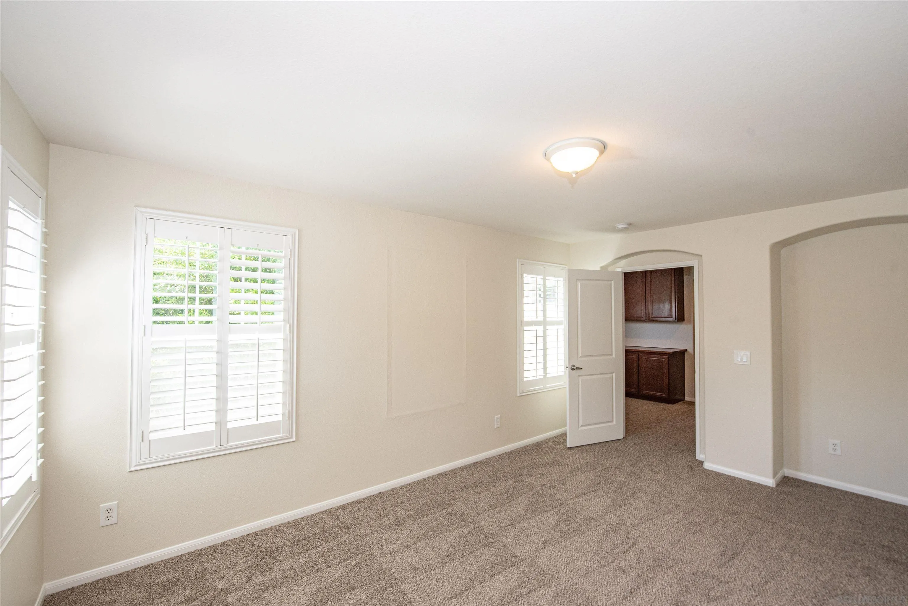 1602 Saddle Ridge Drive Chula Vista, CA 91915 - Photo 14 of 34 an empty room with windows and closet