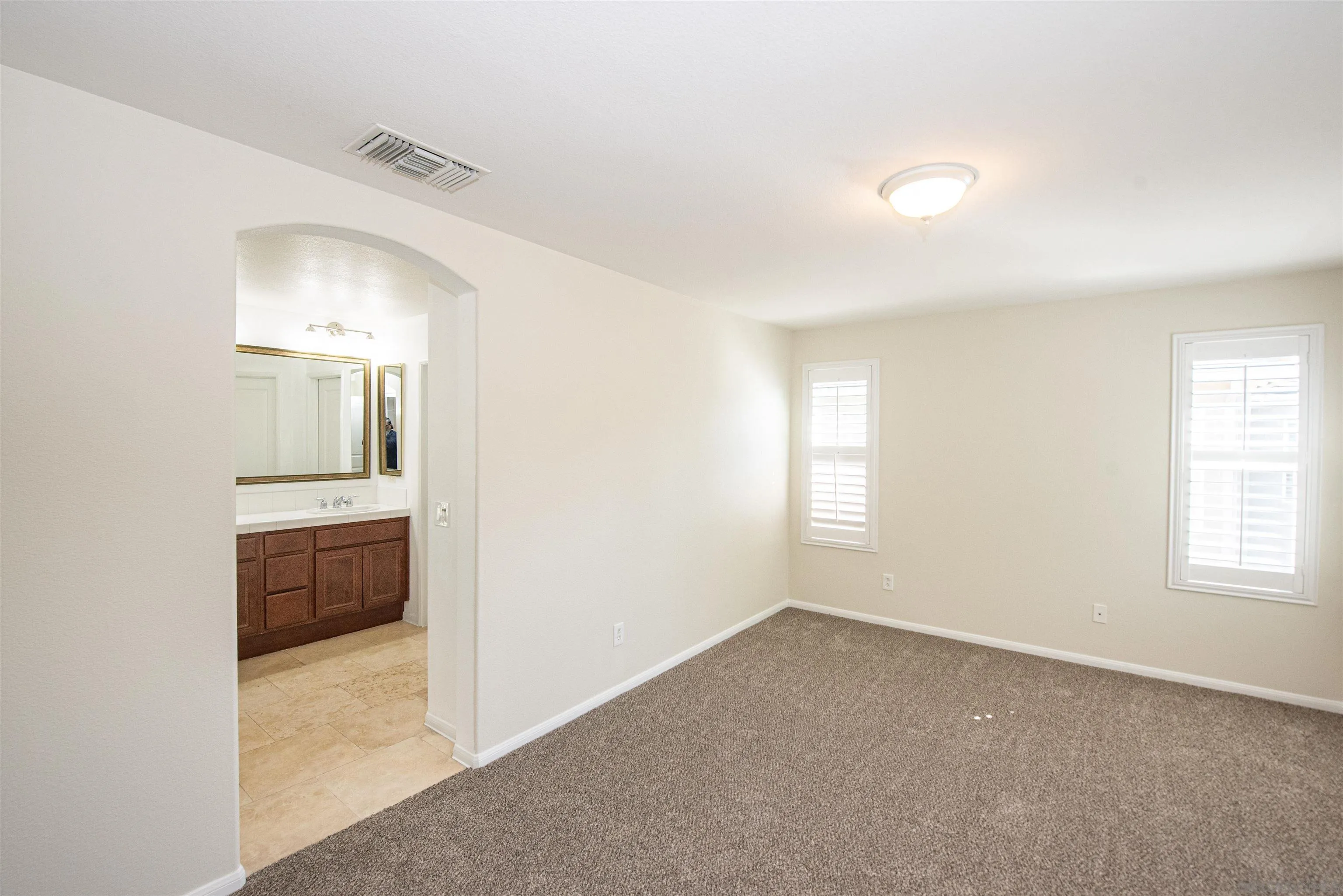 1602 Saddle Ridge Drive Chula Vista, CA 91915 - Photo 15 of 34 an empty room with a bathroom and a sink