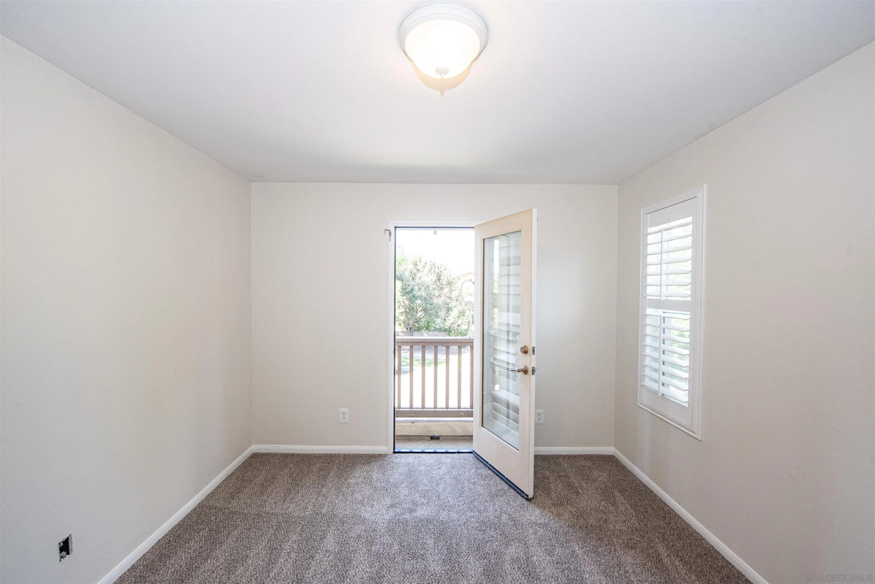 1602 Saddle Ridge Drive Chula Vista, CA 91915 - Photo 21 of 34 an empty room with windows