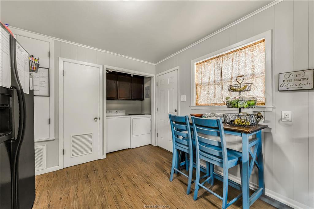 109 Sulphur Springs Road Bryan, TX 77801 - Photo 7 of 15 a view of a dining room with furniture window and wooden floor