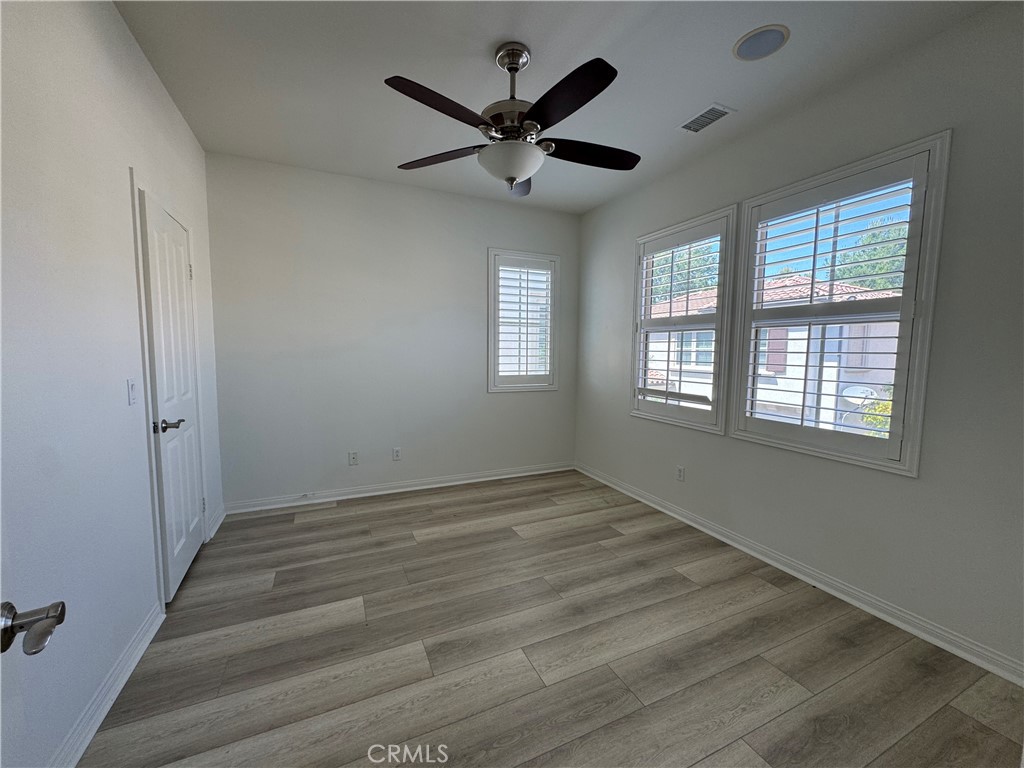 91 Splendor Irvine, CA 92618 - Photo 4 of 11 a view of an empty room with a window