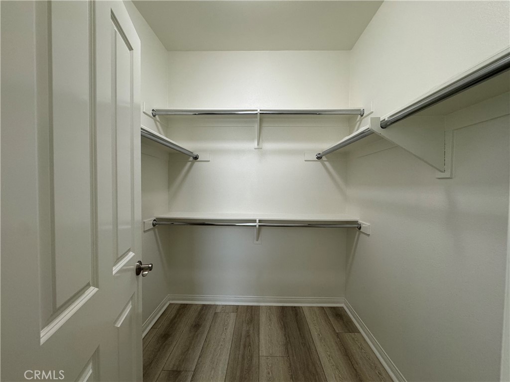 91 Splendor Irvine, CA 92618 - Photo 9 of 11 a walk in closet with empty racks