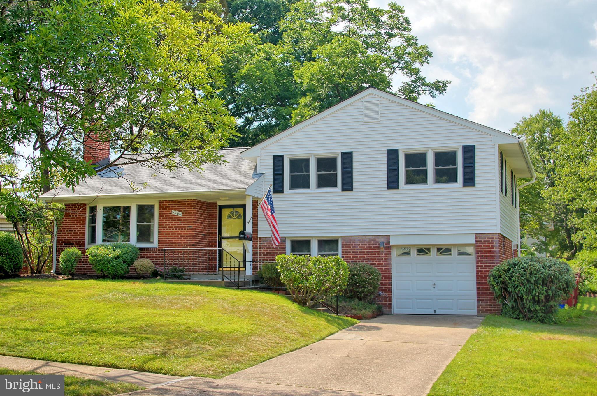 5408 Montgomery Street Springfield, VA 22151 - Photo 1 of 30 a front view of a house with yard