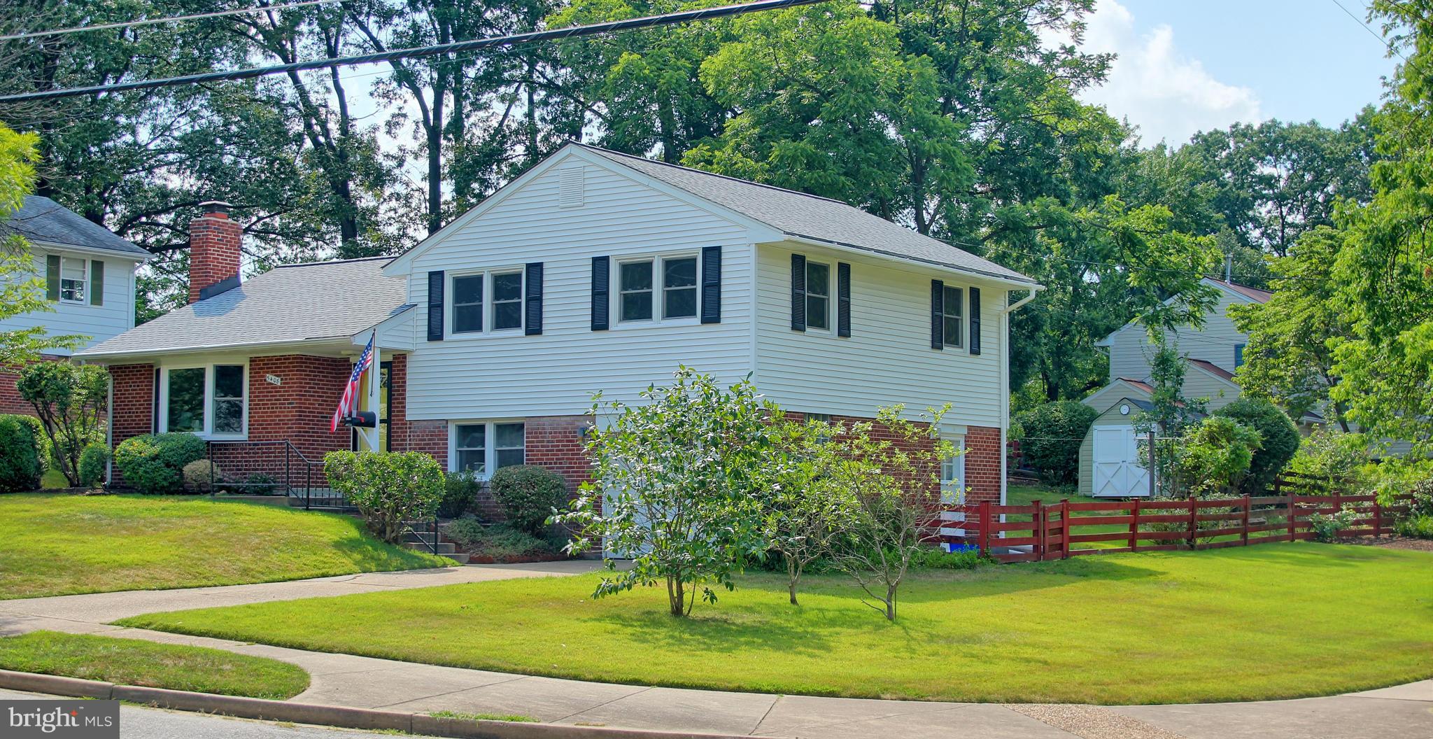 5408 Montgomery Street Springfield, VA 22151 - Photo 2 of 30 a front view of a house with a yard