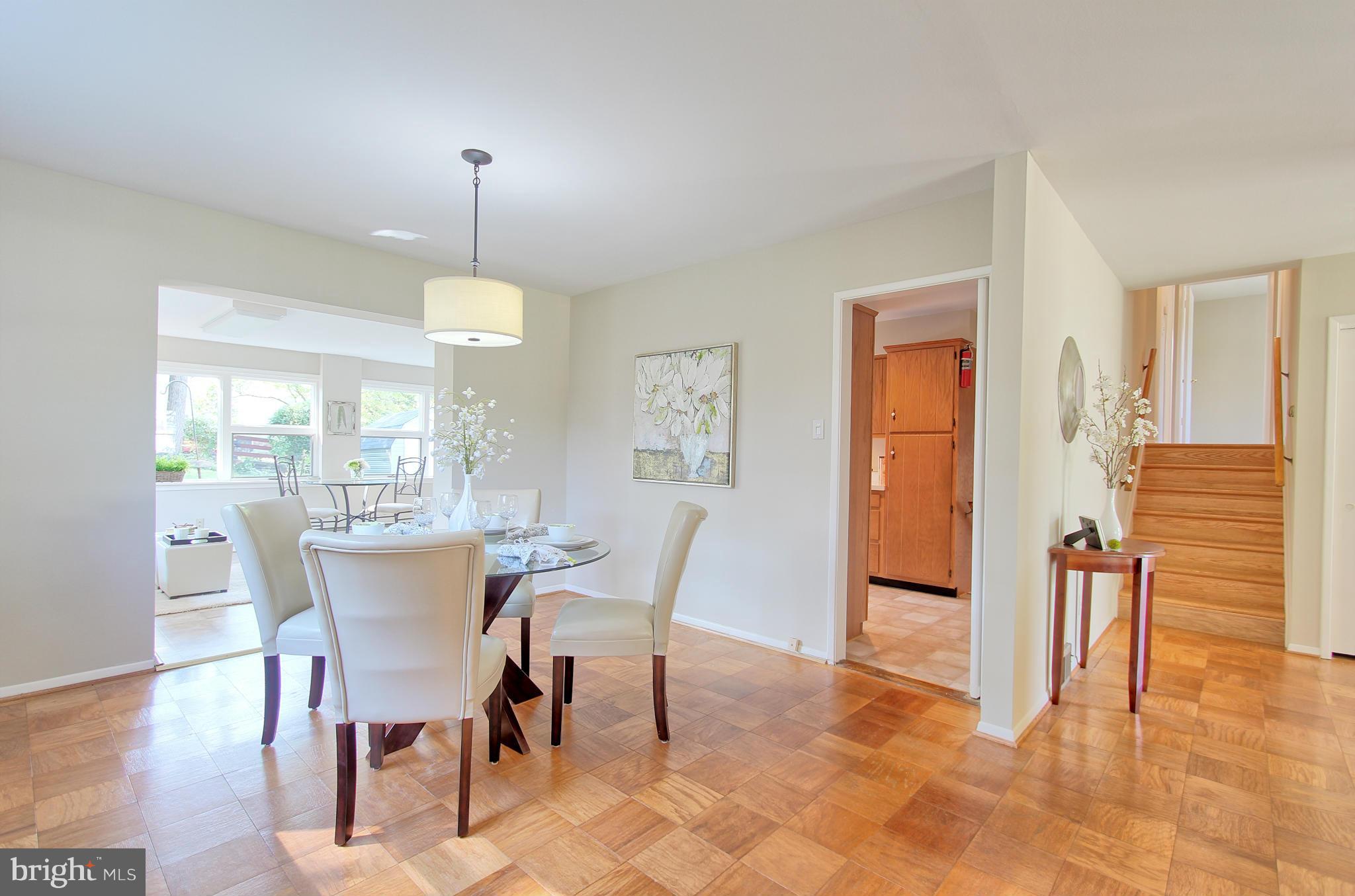 5408 Montgomery Street Springfield, VA 22151 - Photo 12 of 30 a dining room with furniture and window