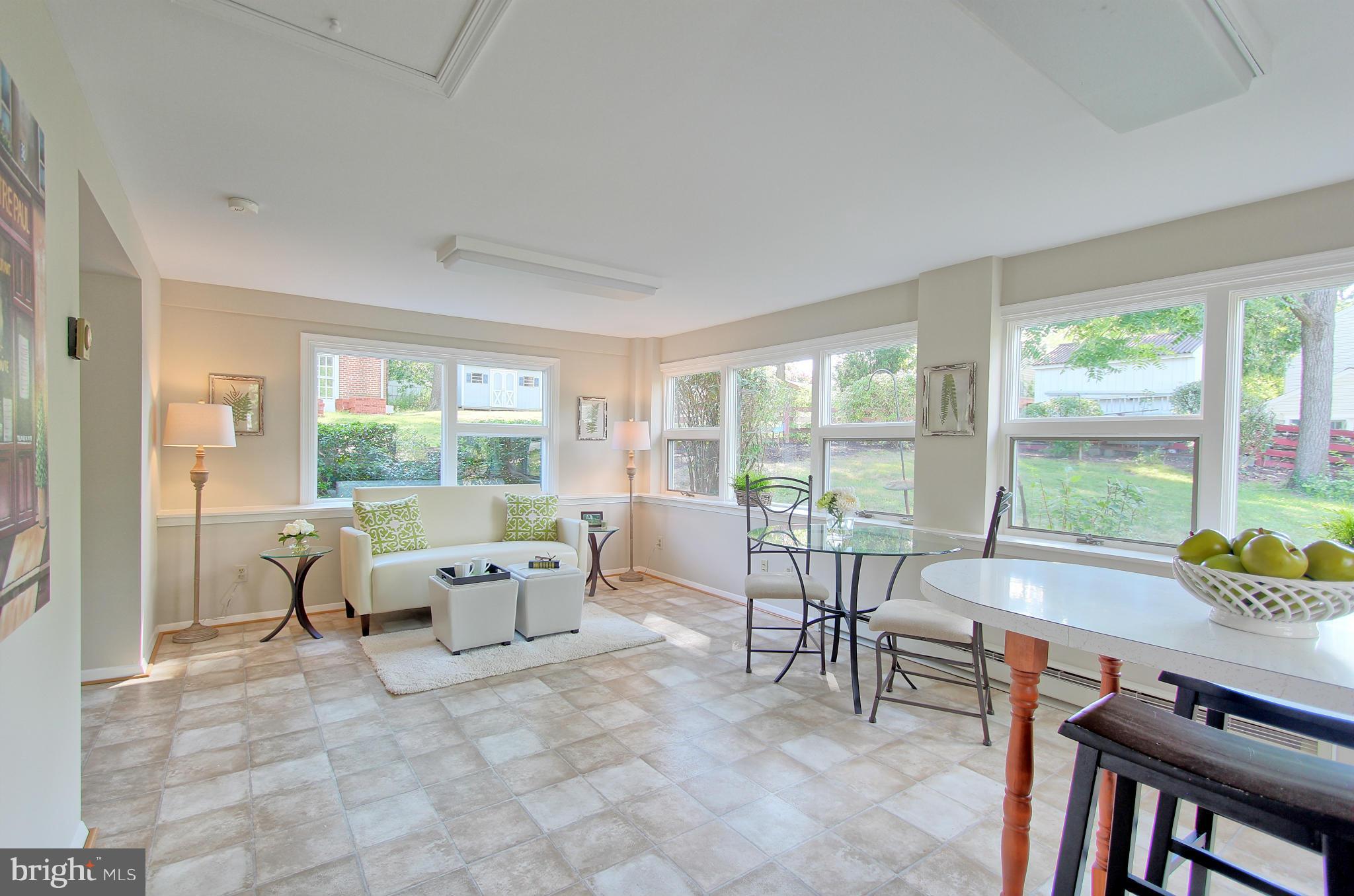 5408 Montgomery Street Springfield, VA 22151 - Photo 13 of 30 a living room with furniture and large windows
