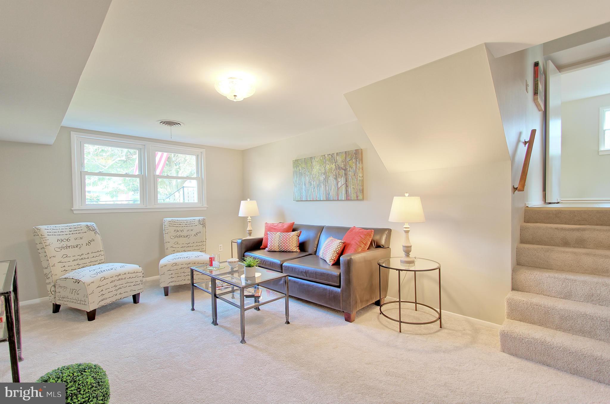 5408 Montgomery Street Springfield, VA 22151 - Photo 18 of 30 a living room with furniture and a window