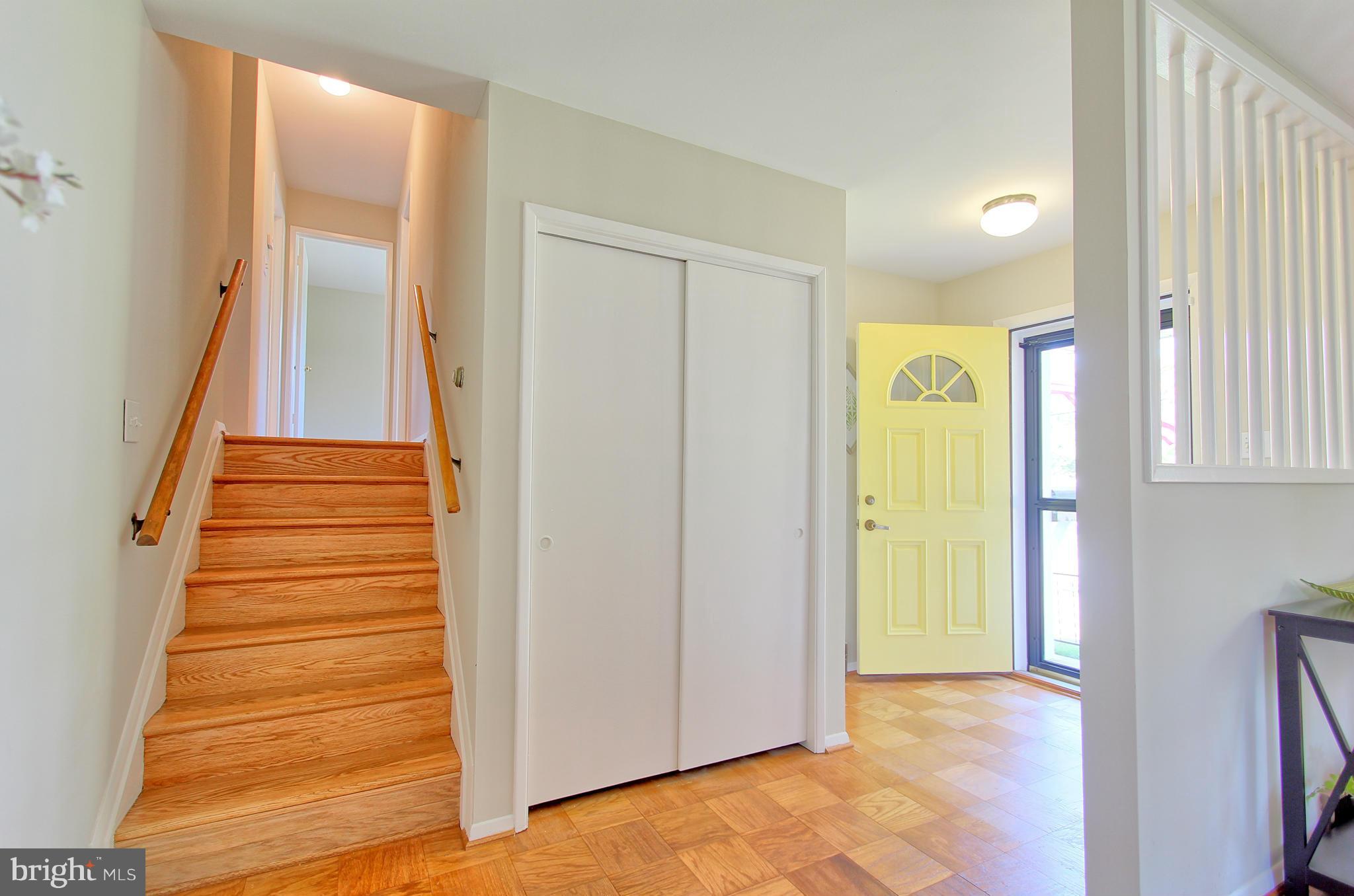 5408 Montgomery Street Springfield, VA 22151 - Photo 21 of 30 a view of a hallway with front door and wooden floor