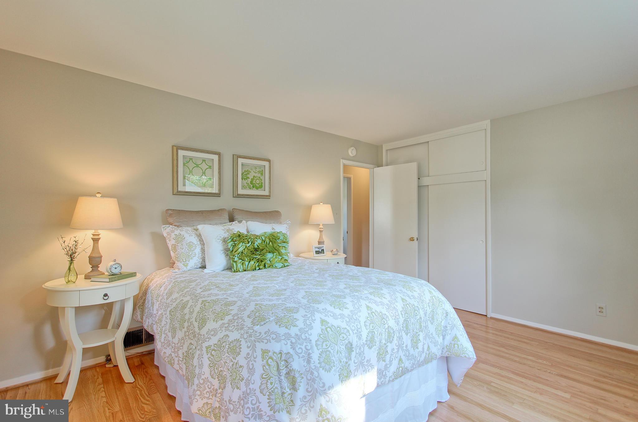 5408 Montgomery Street Springfield, VA 22151 - Photo 23 of 30 a bedroom with a bed and a table
