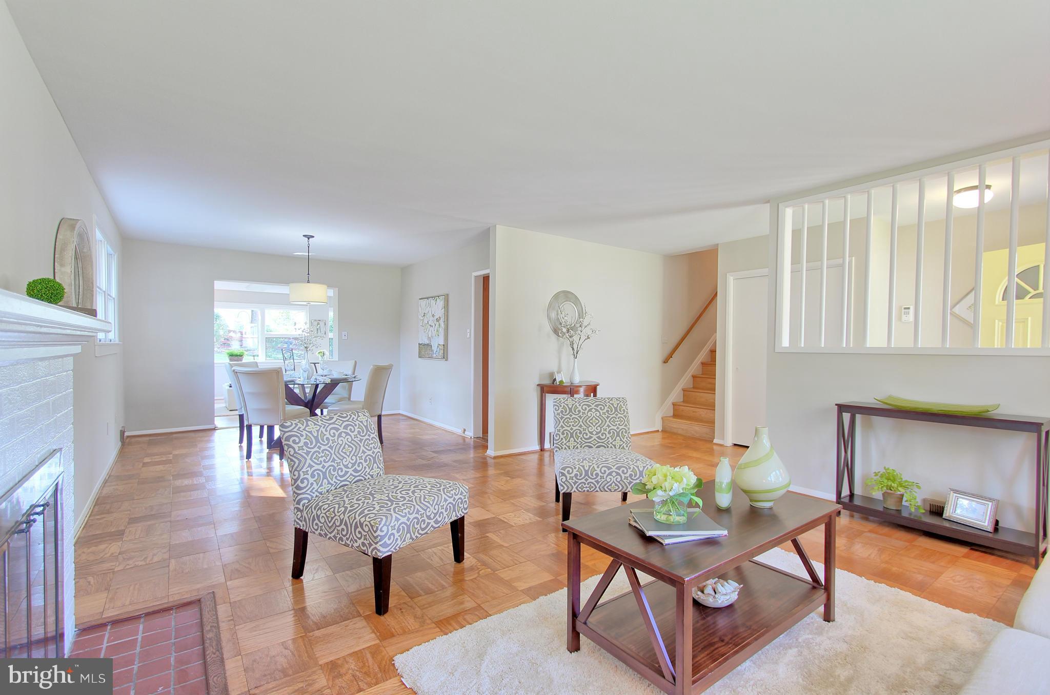 5408 Montgomery Street Springfield, VA 22151 - Photo 8 of 30 a living room with furniture and a wooden floor