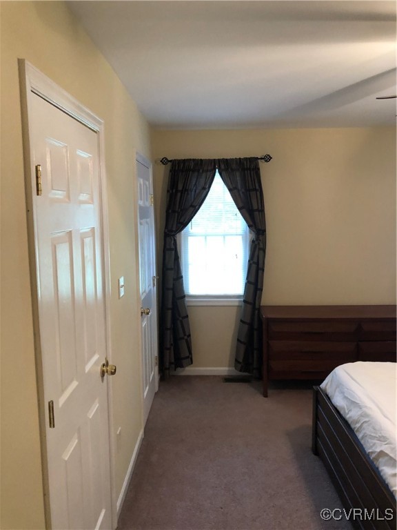 13606 Halifax Road Richmond, VA 23238 - Photo 15 of 50 Carpeted Primary bedroom with baseboards