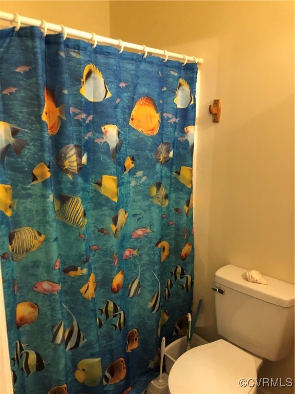 13606 Halifax Road Richmond, VA 23238 - Photo 35 of 50 Full bathroom with toilet and a shower with curtai