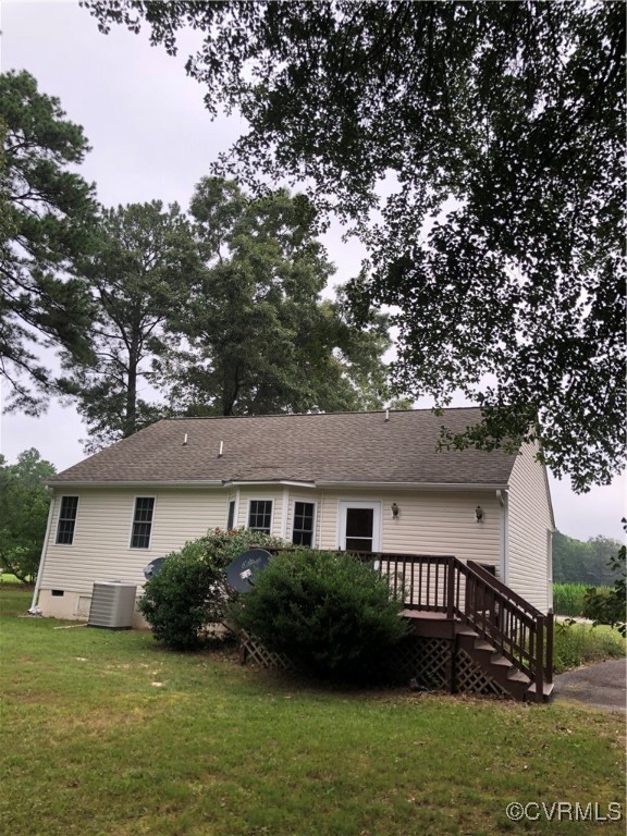 13606 Halifax Road Richmond, VA 23238 - Photo 39 of 50 Back of property with a wooden deck, a lawn, and a