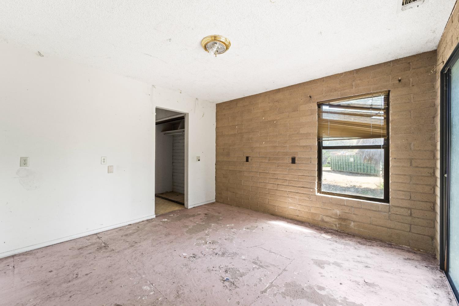 15595 Highway 16 Capay, CA 95607 - Photo 12 of 68 an empty room with windows