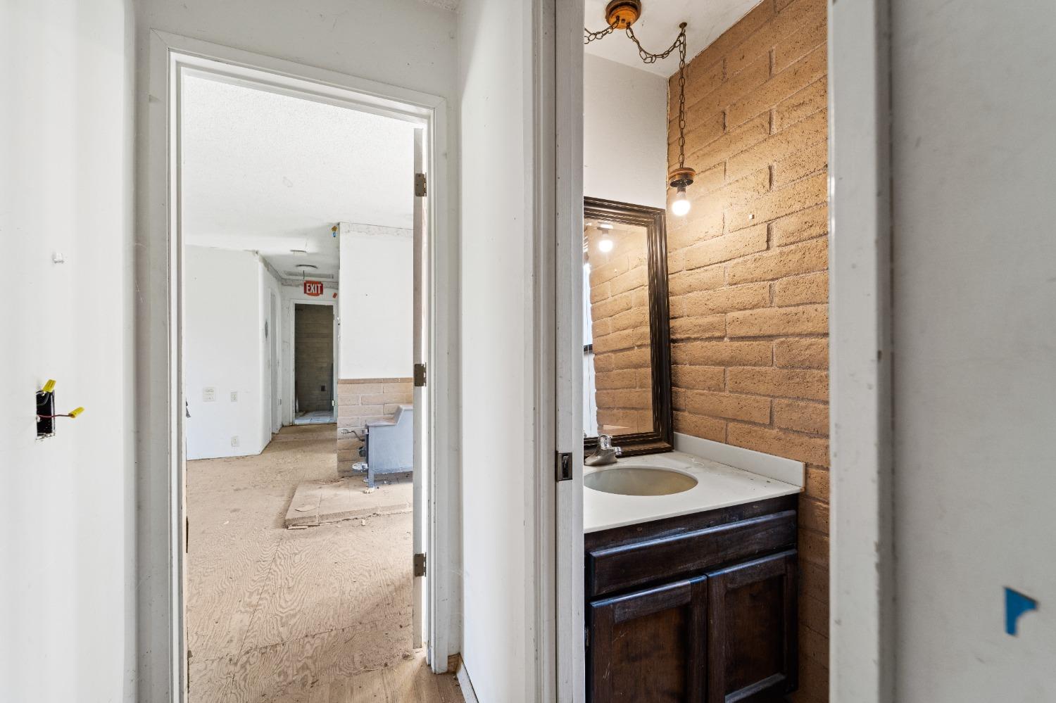 15595 Highway 16 Capay, CA 95607 - Photo 22 of 68 a bathroom with a sink and a mirror