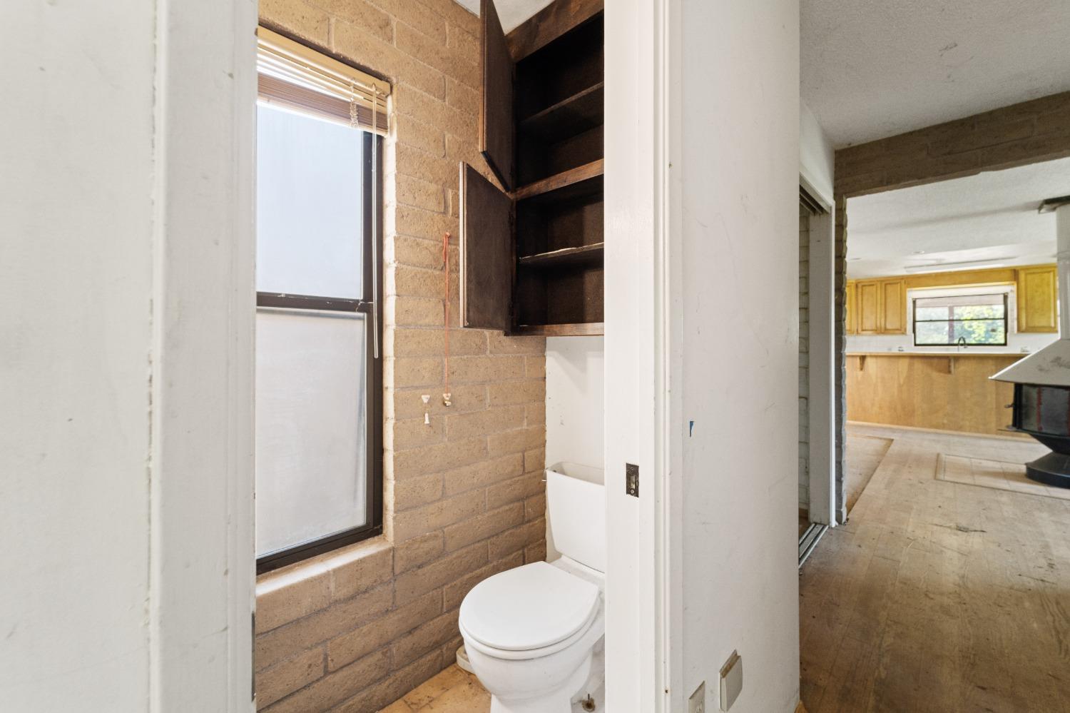 15595 Highway 16 Capay, CA 95607 - Photo 23 of 68 a bathroom with a toilet and a shower