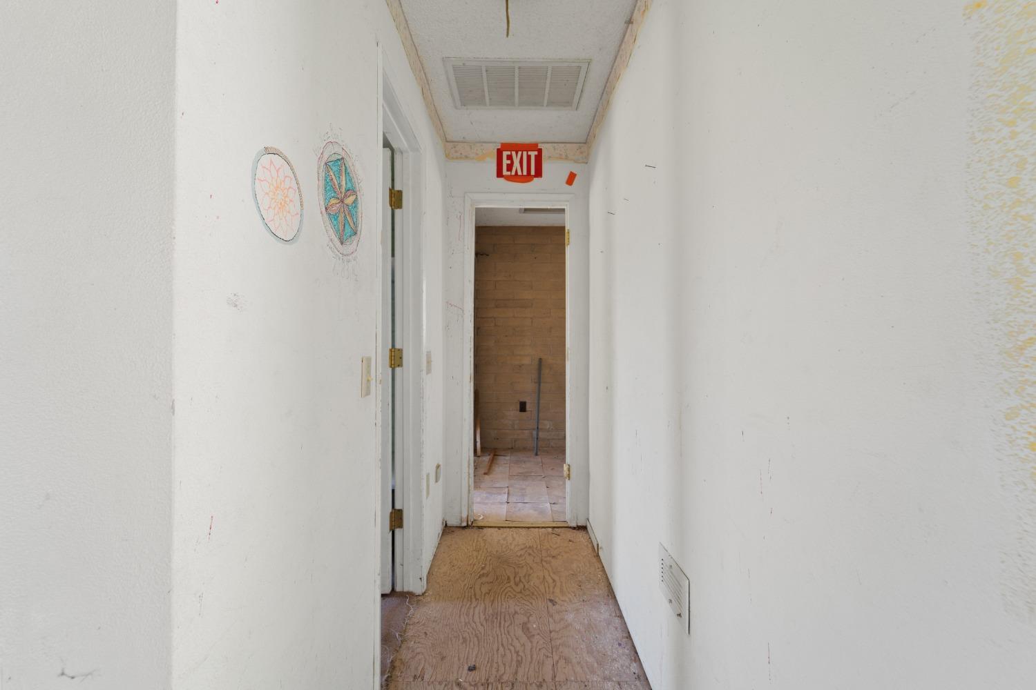 15595 Highway 16 Capay, CA 95607 - Photo 29 of 68 a view of a hallway with wooden floor