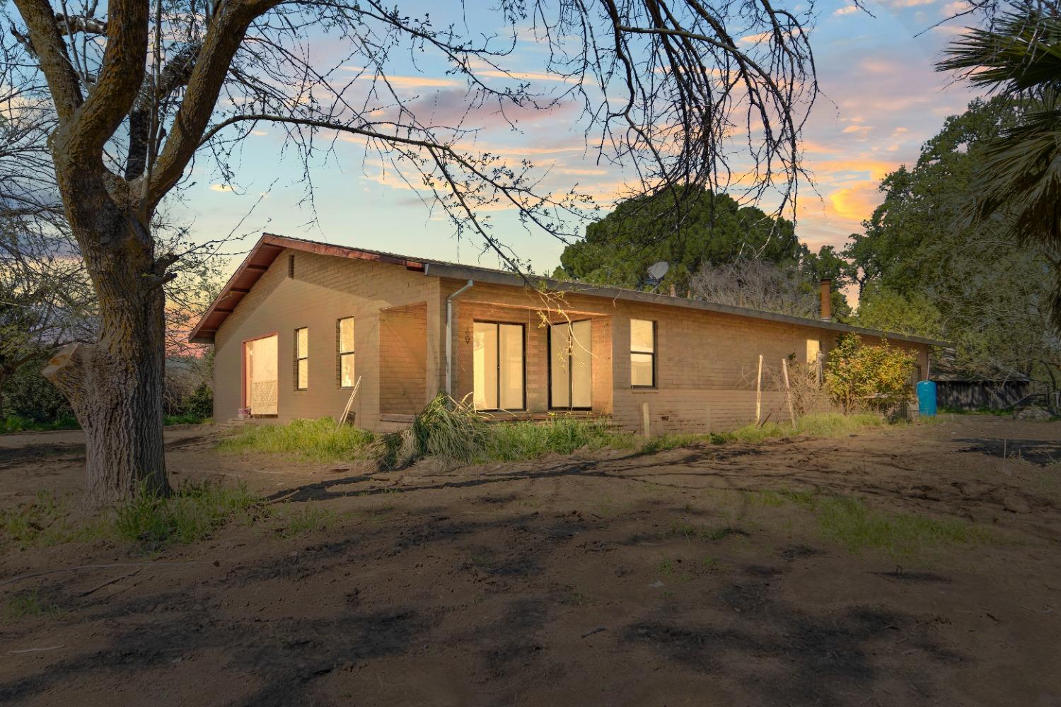 15595 Highway 16 Capay, CA 95607 - Photo 38 of 68 a front view of a house with garden