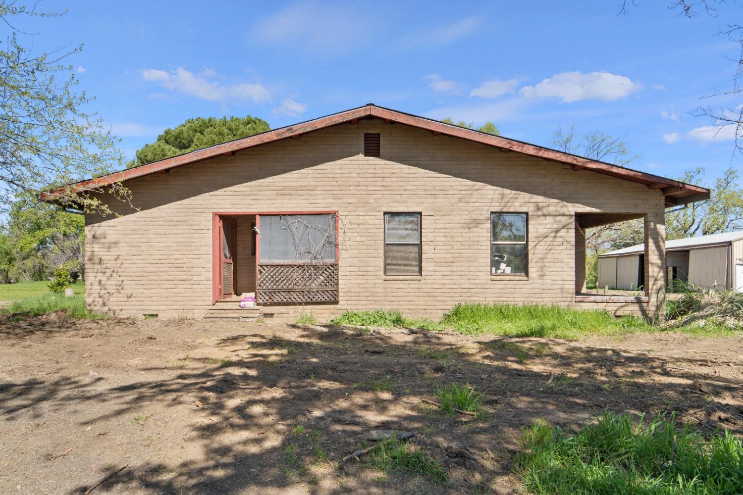 15595 Highway 16 Capay, CA 95607 - Photo 39 of 68 a front view of a house with a yard