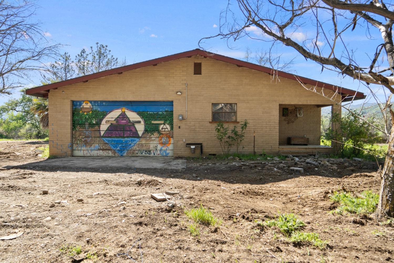 15595 Highway 16 Capay, CA 95607 - Photo 44 of 68 a front view of a house with a yard