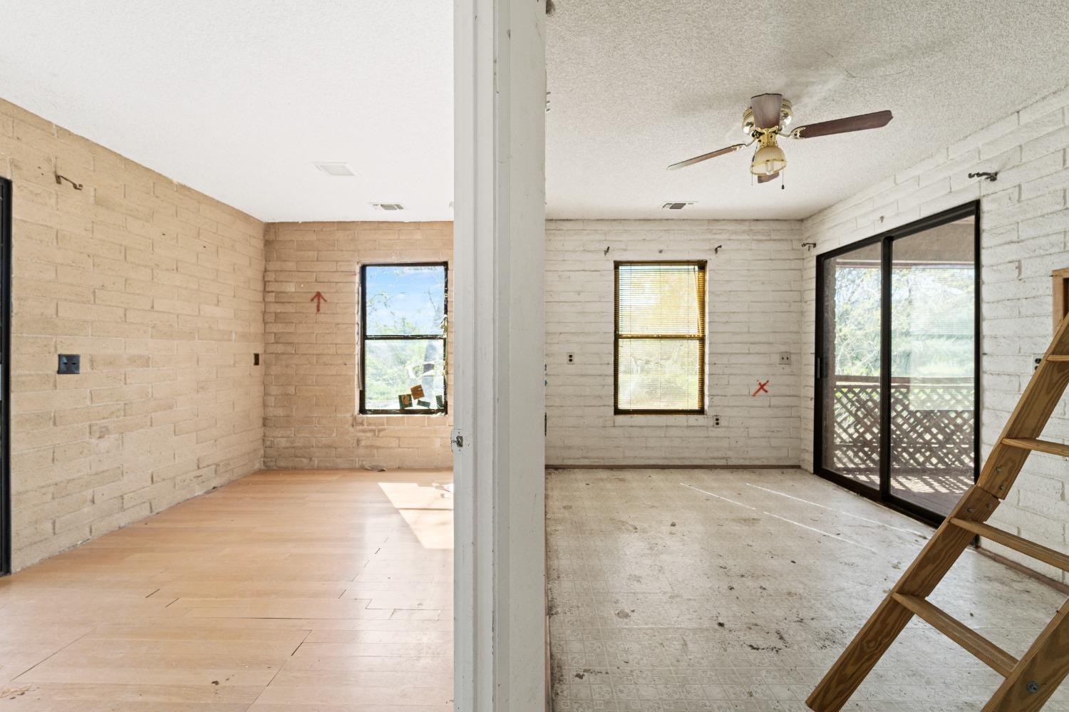 15595 Highway 16 Capay, CA 95607 - Photo 8 of 68 wooden floor in an empty room with a window