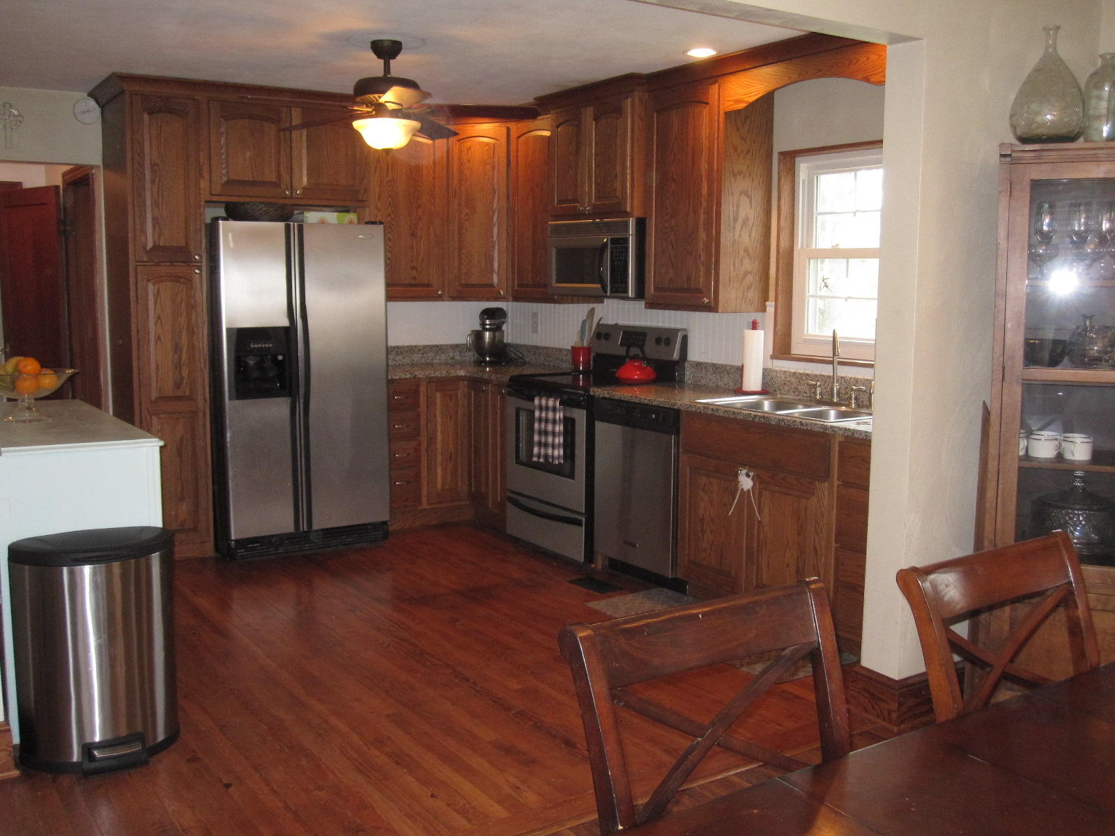 1909 Retreat Road Boones Mill, VA 24065 - Photo 35 of 59 a kitchen with kitchen island a counter top space cabinets and stainless steel appliances