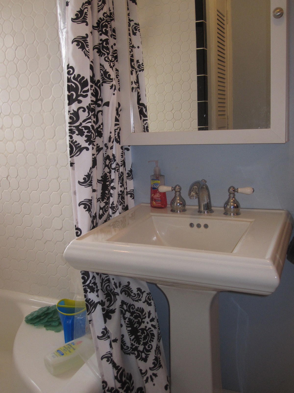 1909 Retreat Road Boones Mill, VA 24065 - Photo 38 of 59 a bathroom with a sink and a mirror