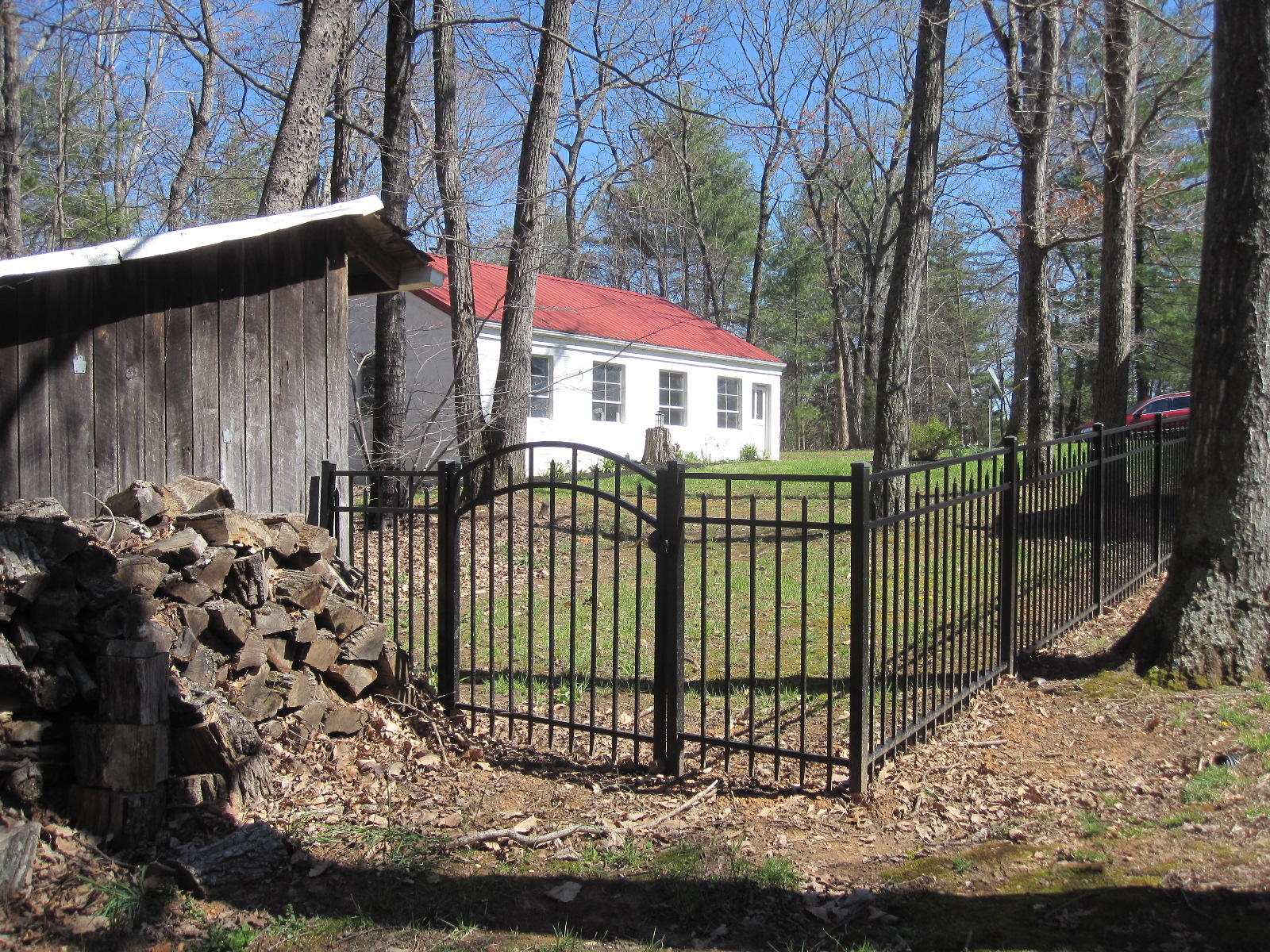 1909 Retreat Road Boones Mill, VA 24065 - Photo 10 of 59 a view of a house with a small yard and wooden fence