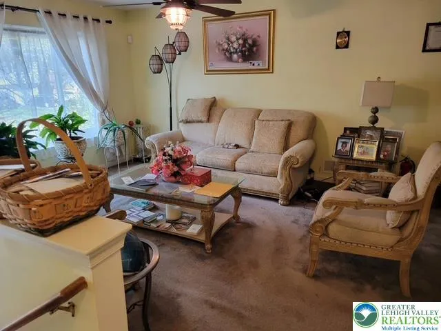 a room with furniture and a fireplace