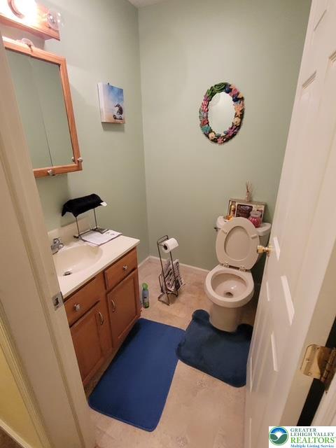 2137 Freedom Way Pocono Summit, PA 18346 - Photo 19 of 33 a bathroom with a sink and a mirror