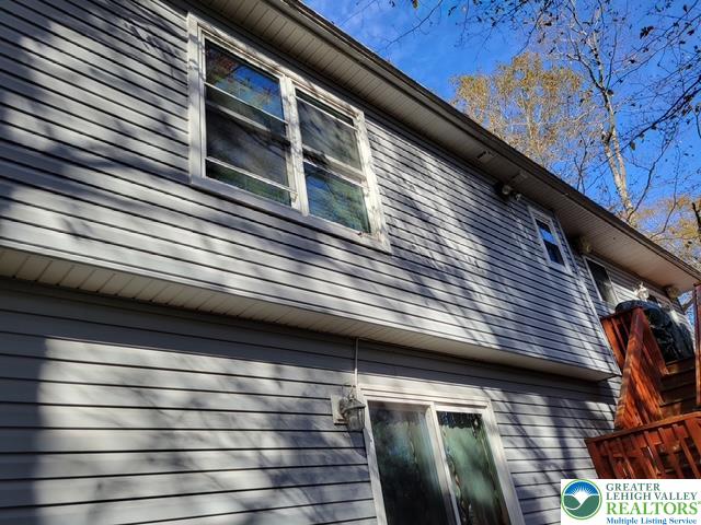 2137 Freedom Way Pocono Summit, PA 18346 - Photo 2 of 33 a view of a building from a window