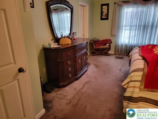 a view of an entryway door with a fireplace