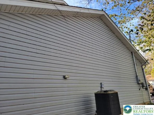 a view of house with a window and wooden floor