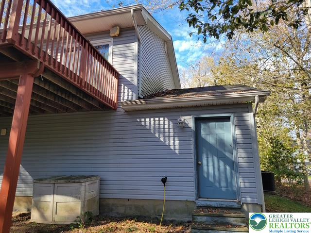 2137 Freedom Way Pocono Summit, PA 18346 - Photo 7 of 33 a view of house with a window and wooden floor
