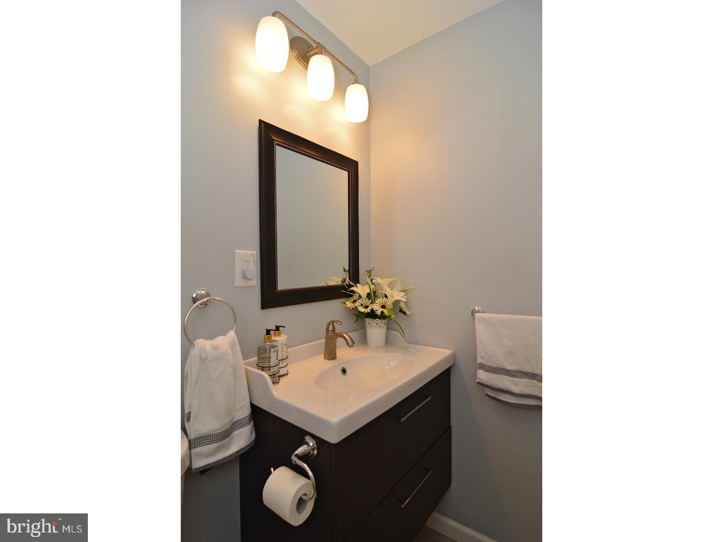 6 Wendy Road Reading, PA 19601 - Photo 16 of 24 a bathroom with a sink and a mirror