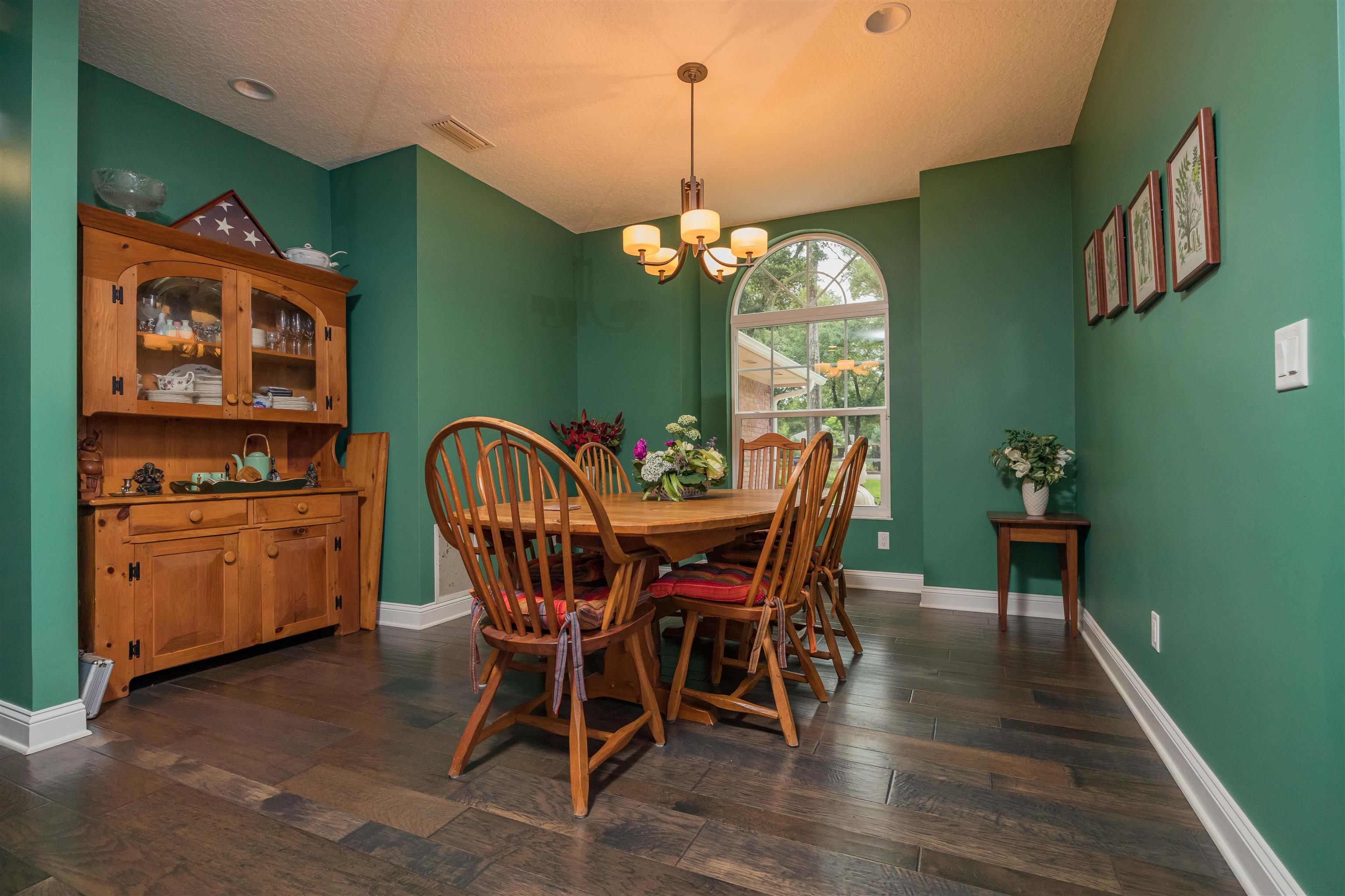 4209 Wicks Branch Road St. Augustine, FL 32086 - Photo 8 of 50 a view of a dining room with furniture window and wooden floor