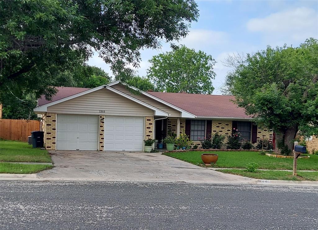 2303 Dover Road Killeen, TX 76543 - Photo 18 of 18 Front view of the home featuring Full Brick Siding, 2 Car Attached Garage with a separate entrance.