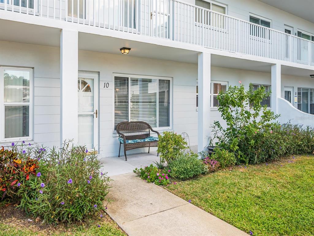 2002 Australia Way East, Unit 10 Clearwater, FL 33763 - Photo 1 of 1 a house view with a garden space