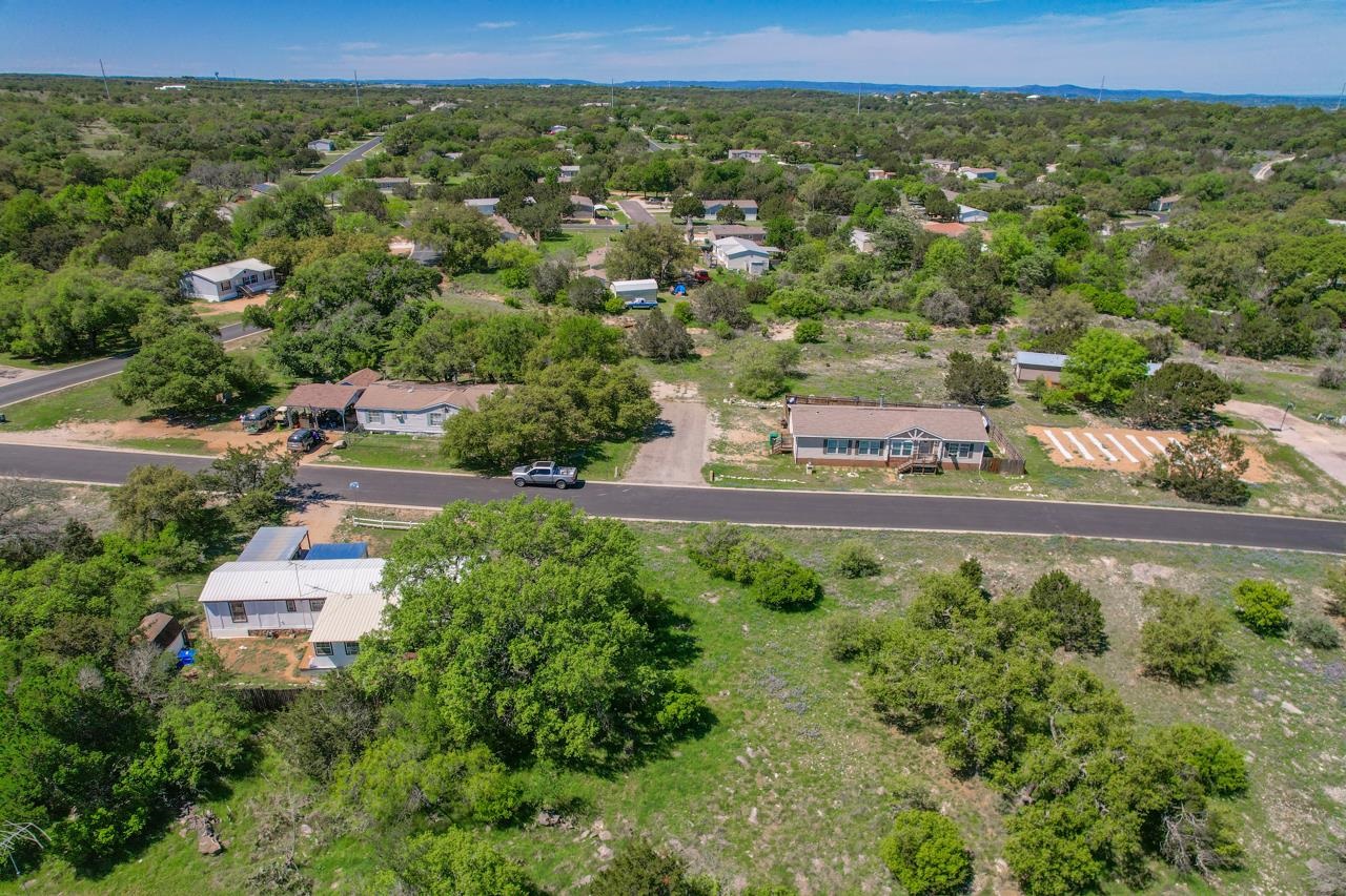 Tbd Lost Creek Road Thorndale, TX 76577 - Photo 5 of 15 an aerial view of residential houses with outdoor space and trees
