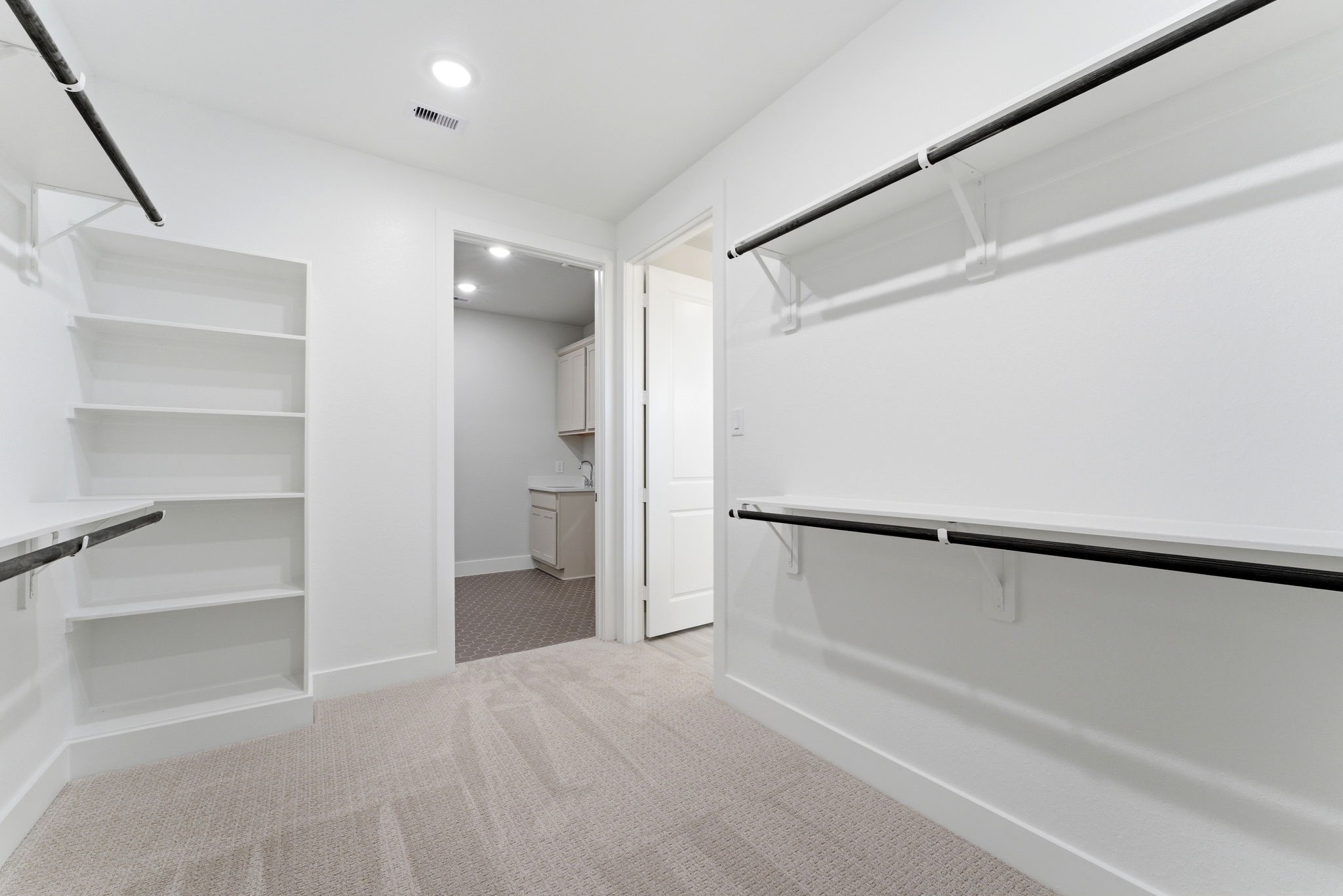 21807 Victory Green Way Porter, TX 77365 - Photo 19 of 50 a view of an empty walk in closet